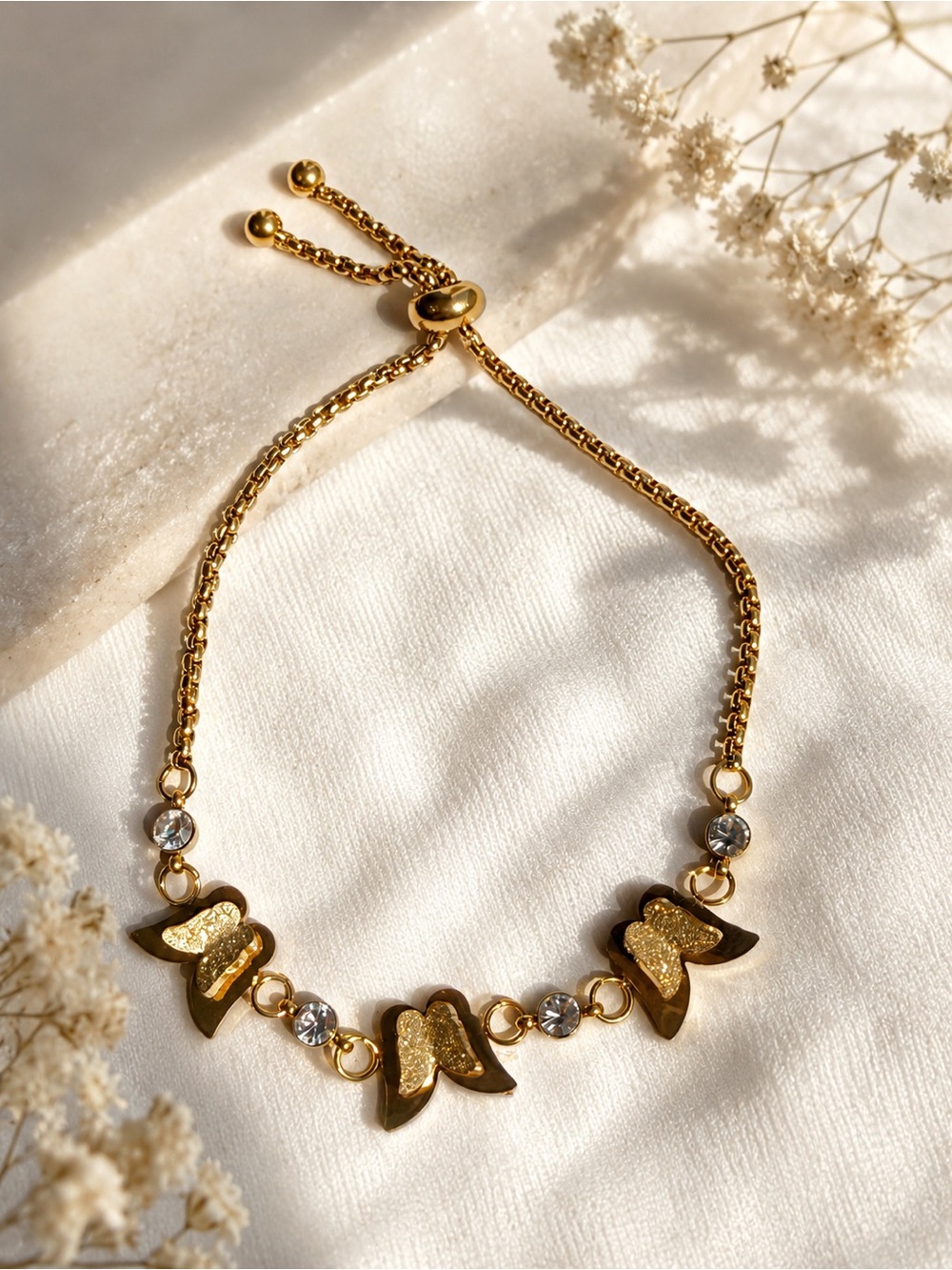 Gold Plated Butterfly Link Bracelet with Crystal Accents